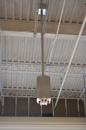 Pole mounted hub in vehicle bay.